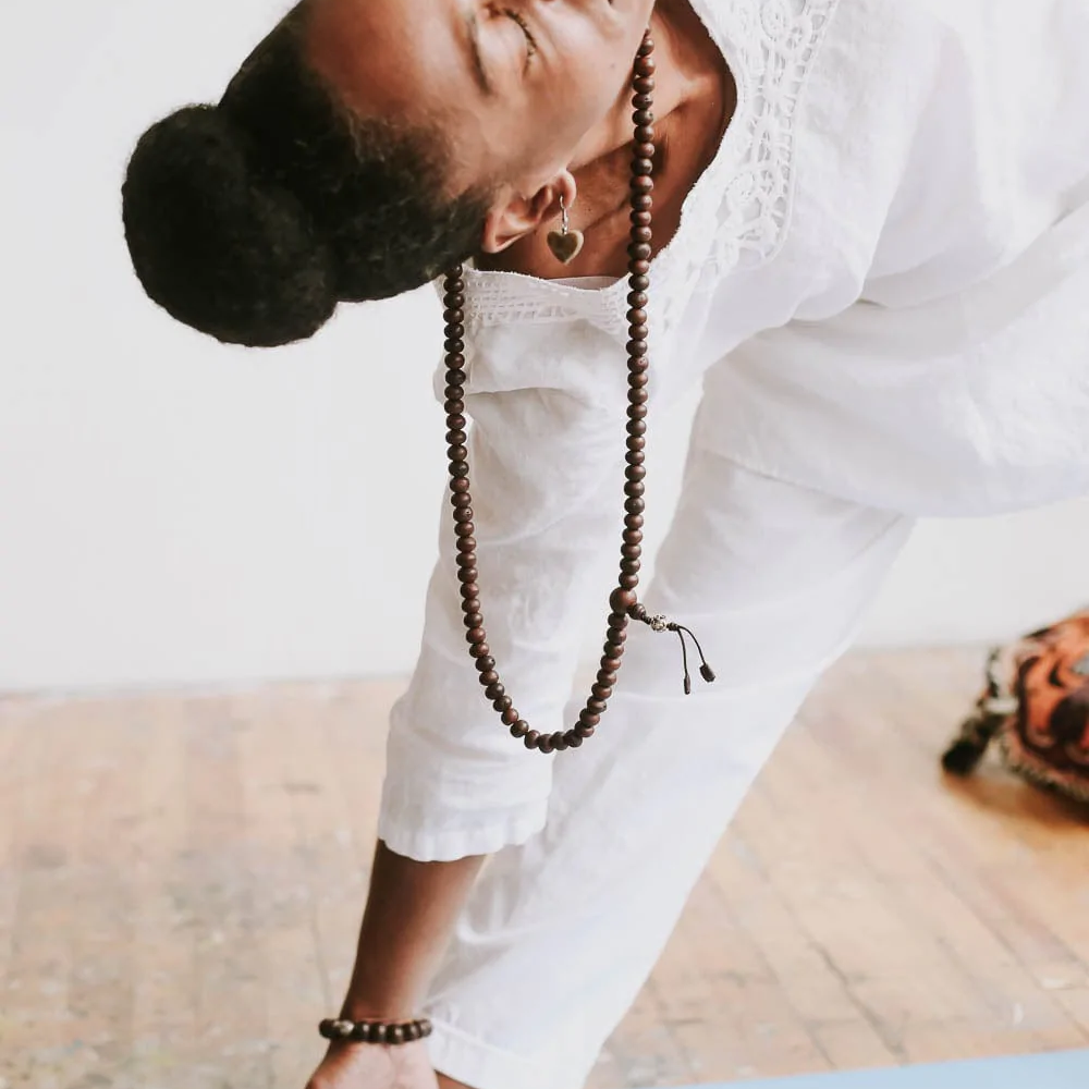 How do you activate a mala necklace?