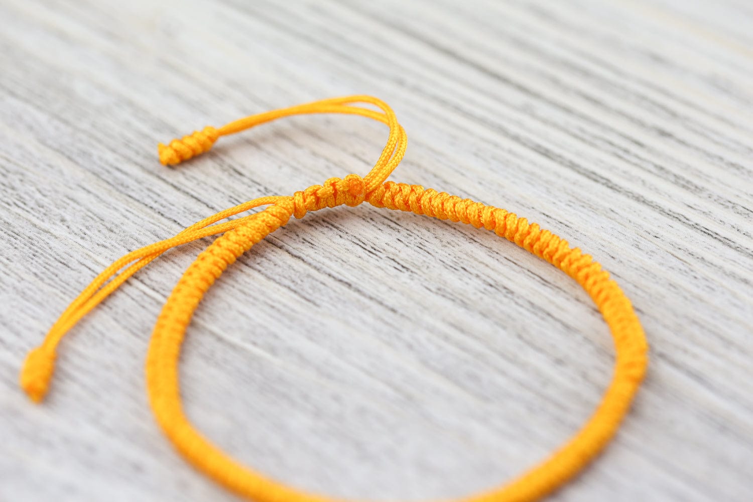 Tibetan Traditions Yellow Knotted Bracelet DharmaShop