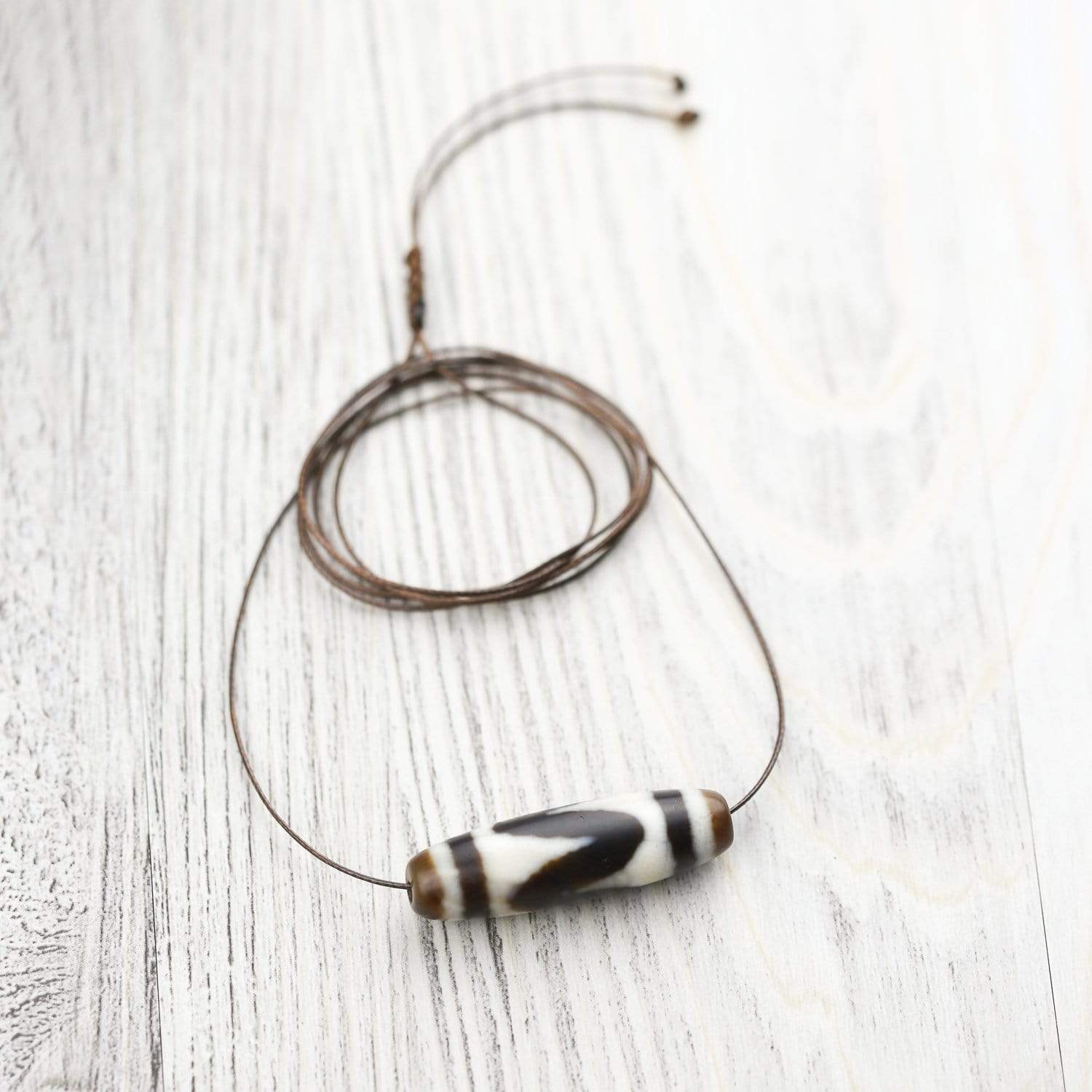 Tiger Tooth Protection Dzi Bead - DharmaShop