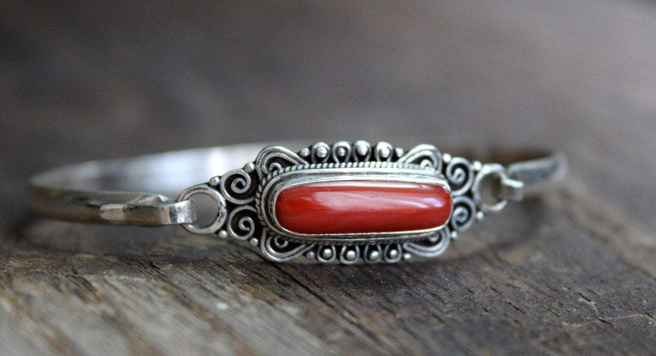https://www.dharmashop.com/cdn/shop/products/jewelry-new-items-default-sterling-silver-and-coral-hook-bracelet-jb439-6591566315566_1280x.jpg?v=1575932314