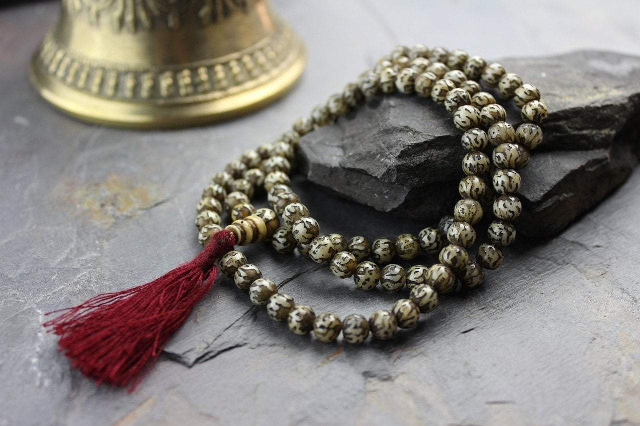 Hand Carved Naga Shell Om Mani Mala - DharmaShop