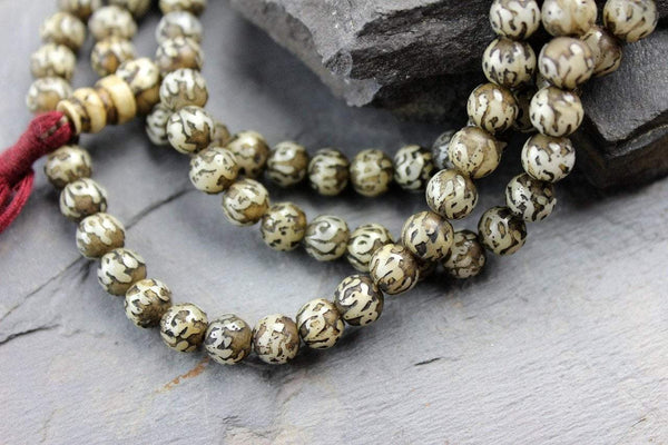 Hand Carved Naga Shell Om Mani Mala - DharmaShop