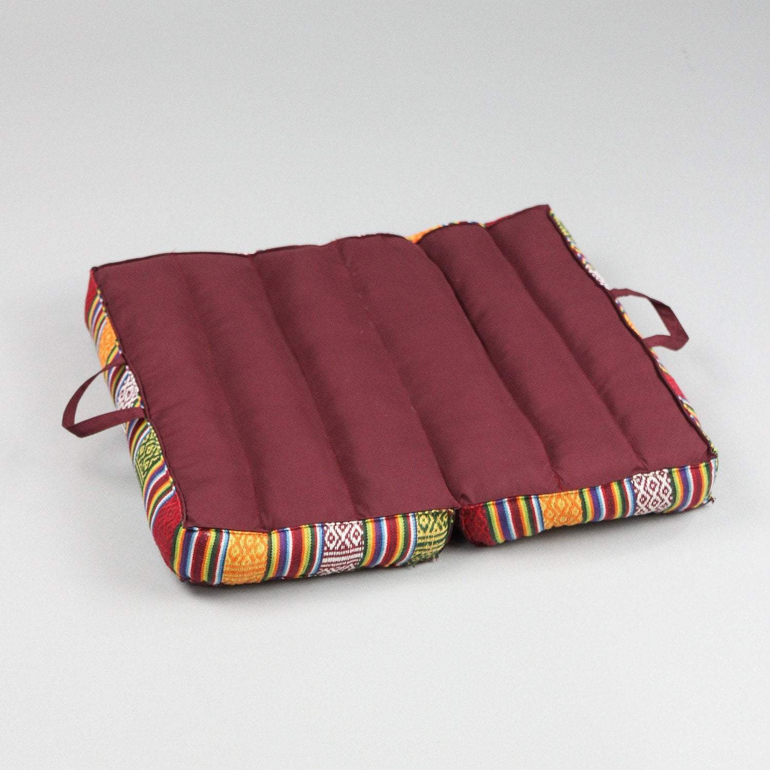 Folding Tibetan Meditation Cushion DharmaShop folding-tibetan-meditation-cushion-dharmashop