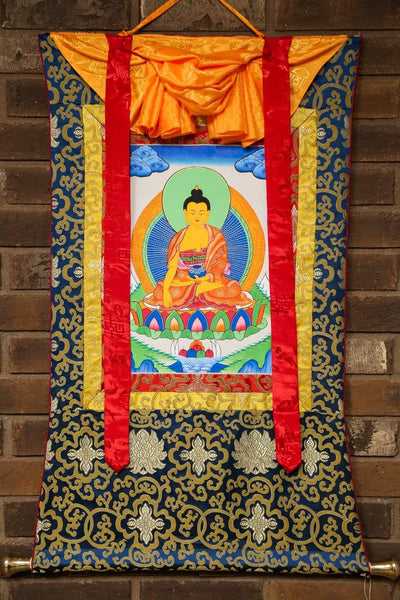 Iluminación Shakyamuni enmarcada Thangka