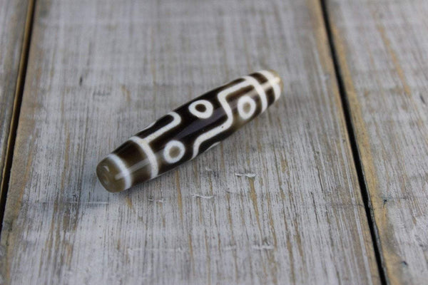 A spectacular 9 Eye Dzi Bead - DharmaShop